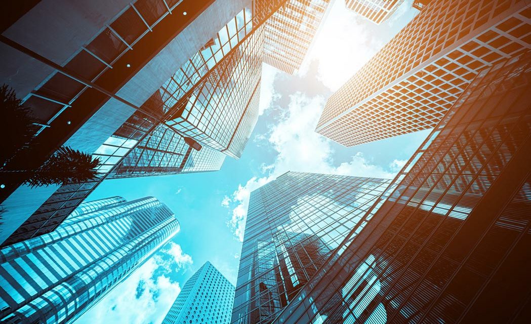 JLL Digital Procurement Transformation - Looking up at High Rise Office Buildings